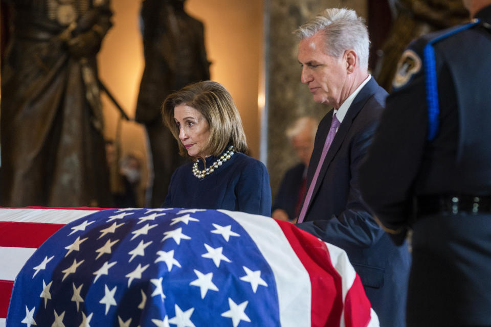House Speaker Nancy Pelosi of Calif., and House Minority Leader Kevin McCarthy of Calif., pay respects during a ceremony for the late Rep. Don Young, R-Alaska, in Statuary Hall as he lies in state on Capitol Hill in Washington, Tuesday, March 29, 2022. Young, the longest-serving member of Alaska's congressional delegation, died Friday, March 18. He was 88. (Shawn Thew/Pool Photo via AP)