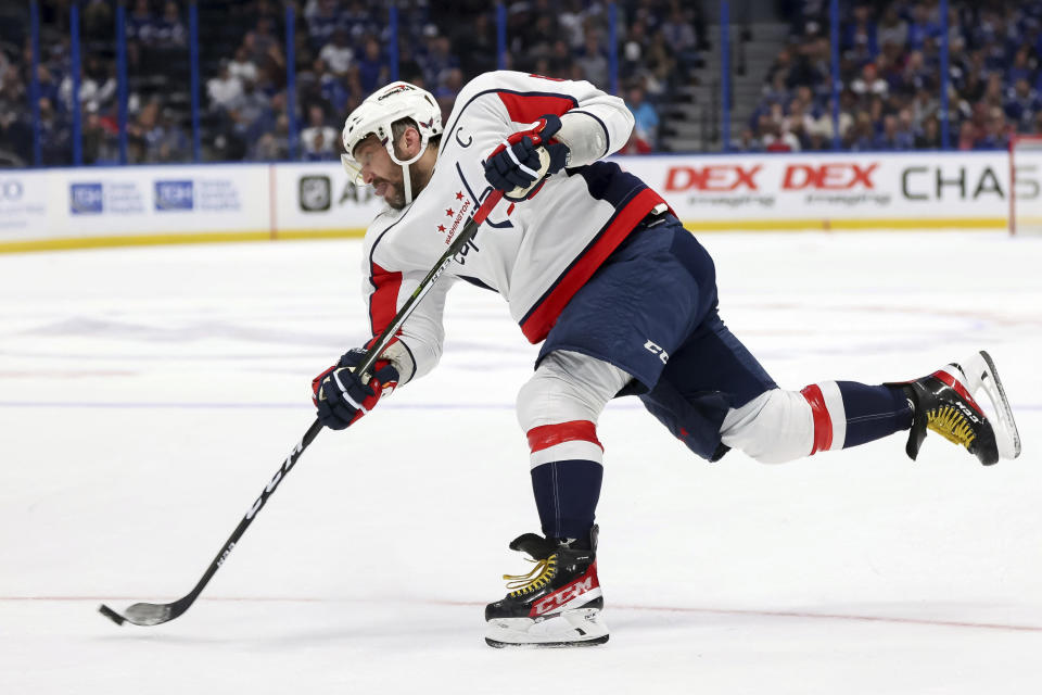 Washington Capitals' Alex Ovechkin, of Russia, shoots against the Tampa Bay Lightning during the first period of an NHL hockey game Monday, Nov. 1, 2021, in Tampa, Fla. (AP Photo/Mike Carlson)