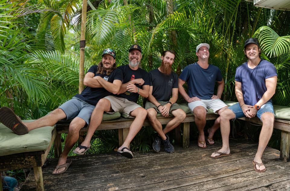 From left: Justin Kaczmarek, Arian Antonucci, Spencer Paterson, Alex Casement and Eddie Kopp pose for a photo at the Sugarshack in Bonita Springs on Thursday, July 27, 2023. The group started Sugarshack Sessions in 2014.