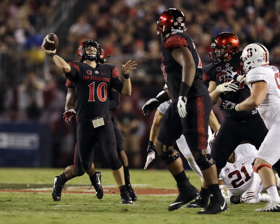 San Diego State quarterback Christian Chapman throws a pass during the first half of an NCAA college football game against Stanford Saturday, Sept. 16, 2017, in San Diego. (AP Photo/Gregory Bull)