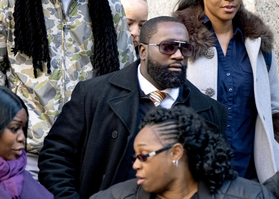 FILE - In this Nov. 25, 2019, file photo Michael Thomas, a federal jail guard responsible for monitoring Jeffrey Epstein the night he killed himself, leaves federal court in New York. The two Bureau of Prisons workers tasked with guarding Epstein the night he killed himself, Tava Noel and Thomas, have admitted they falsified records but will skirt any time behind bars under a deal with federal prosecutors, authorities said Friday, May 21, 2021. (AP Photo/Craig Ruttle, File)