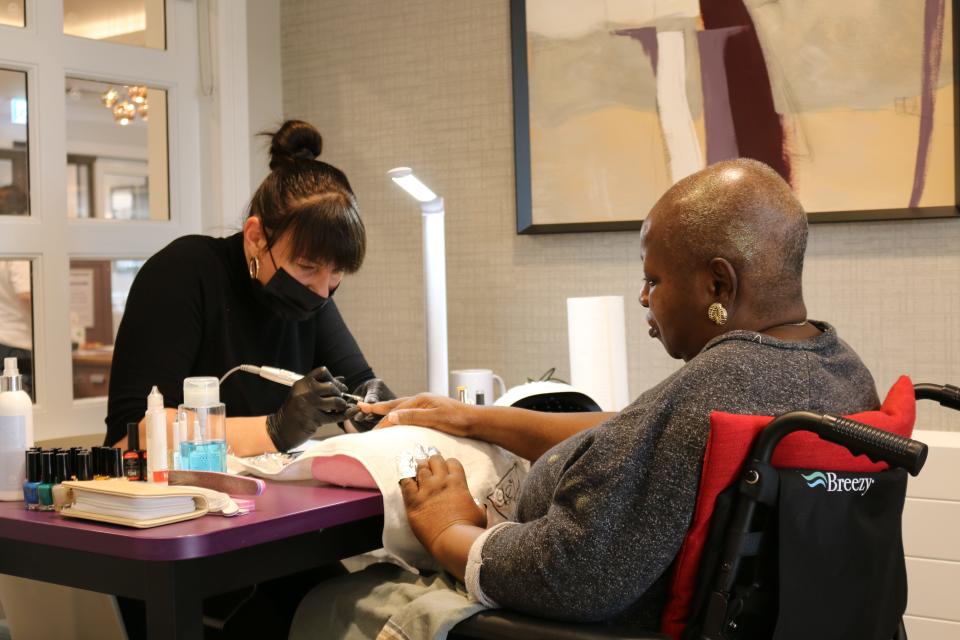 Woman getting her nails done