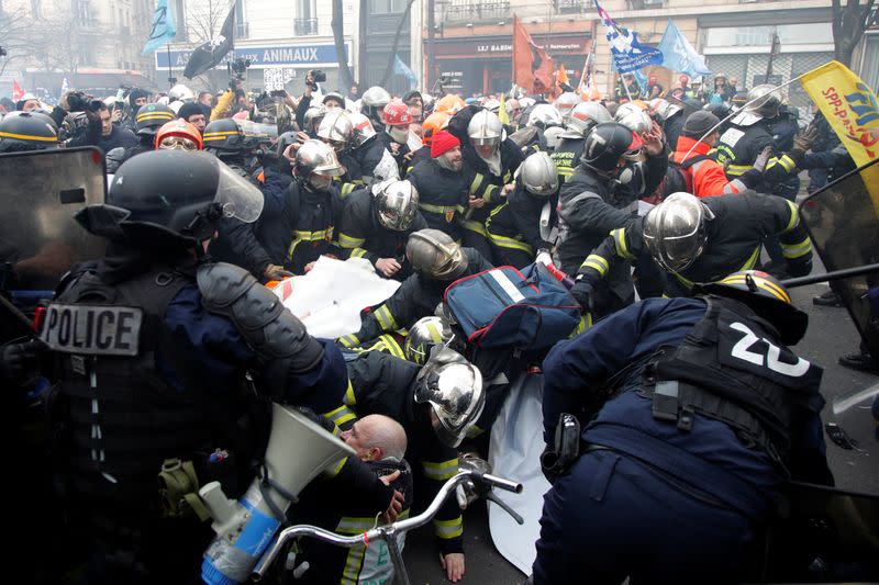 French firefighters demonstrate during a national protest in Paris