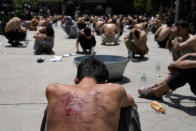 Afghan Shiite Muslim attend a mourning ceremony three days ahead of Ashoura to mark Ashoura, in a mosque in Kabul, Afghanistan, Friday, Aug. 5, 2022. Ashoura falls on the 10th day of Muharram, the first month of the Islamic calendar, when Shiites mark the death of Hussein, the grandson of the Prophet Muhammad, at the Battle of Karbala in present-day Iraq in the 7th century. (AP Photo/Ebrahim Noroozi)