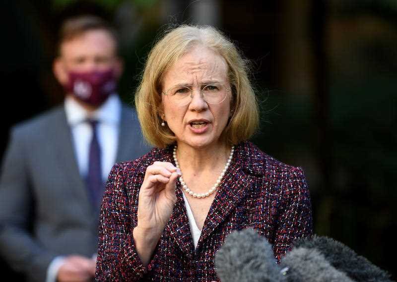 Queensland Chief Health Officer Dr Jeannette Young, flanked by Deputy Premier Steven Miles speaks to the media during a press conference at Parliament House in Brisbane.