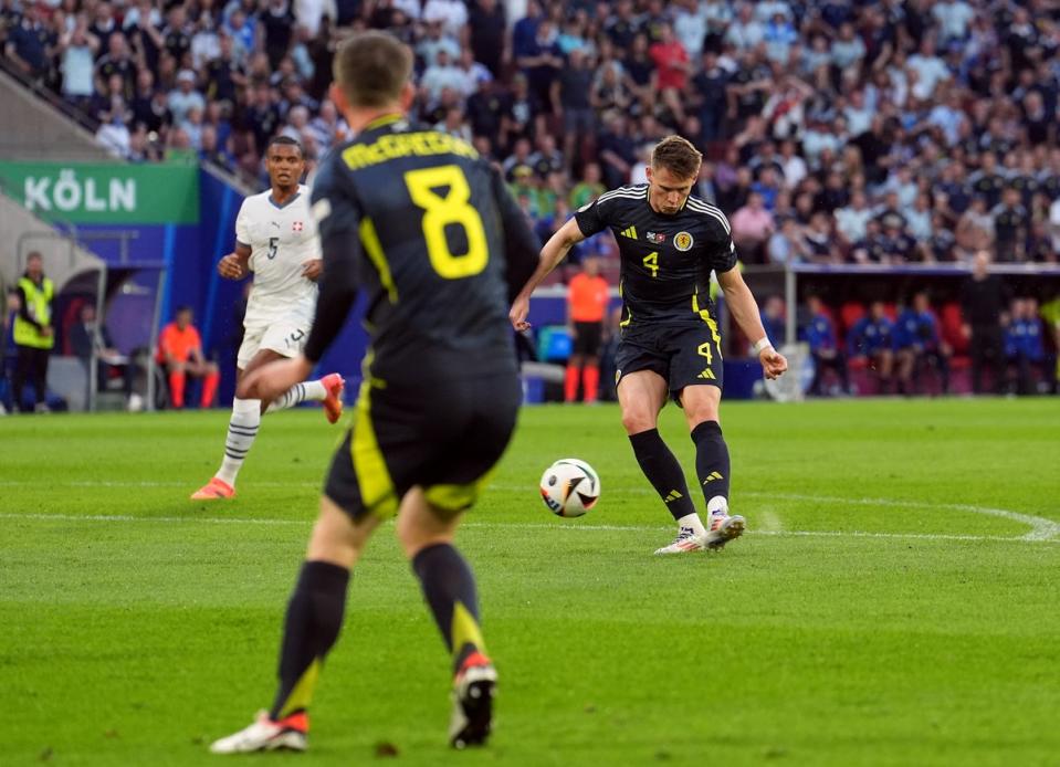 Scott McTominay shoots to score Scotland’s goal (Martin Rickett/PA Wire)