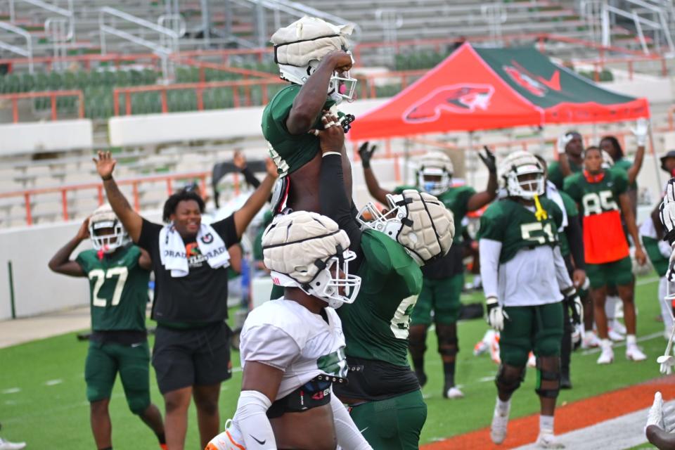 Florida A&M University running back Terrell Jennings and offensive lineman Dariyon Weeden celebrates touchdown in team’s second preseason scrimmage, Aug. 13, 2022
