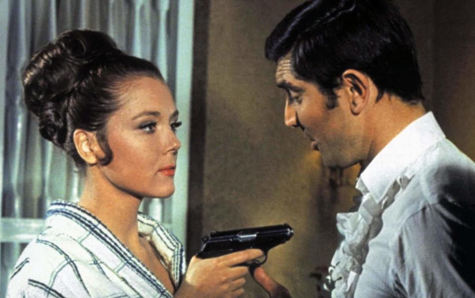 Diana Rigg and George Lazenby in the 1969 James Bond caper On Her Majesty's Secret Service, which Ian Fleming wrote in 1963 - Allstar Picture Library Ltd