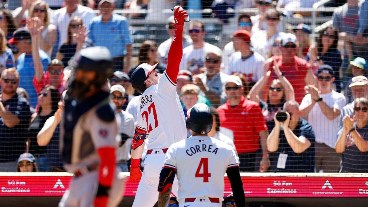 <div>Ryan Jeffers #27 of the Minnesota Twins catches a celebratory home run sausage after crossing home plate on his solo home run against the Boston Red Sox in the third inning at Target Field on May 05, 2024 in Minneapolis, Minnesota.</div> <strong>(David Berding / Getty Images)</strong>