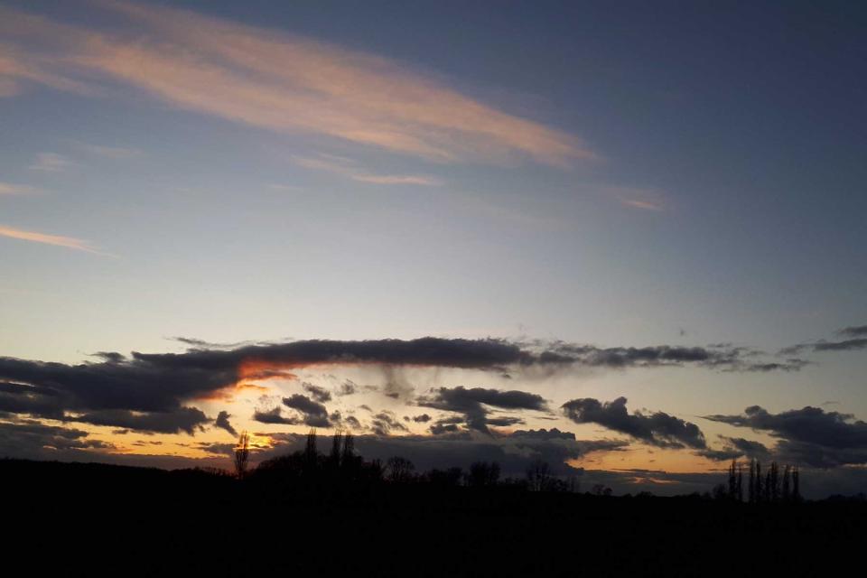 Silhouette of land and sunset in Erquelinnes, Belgium