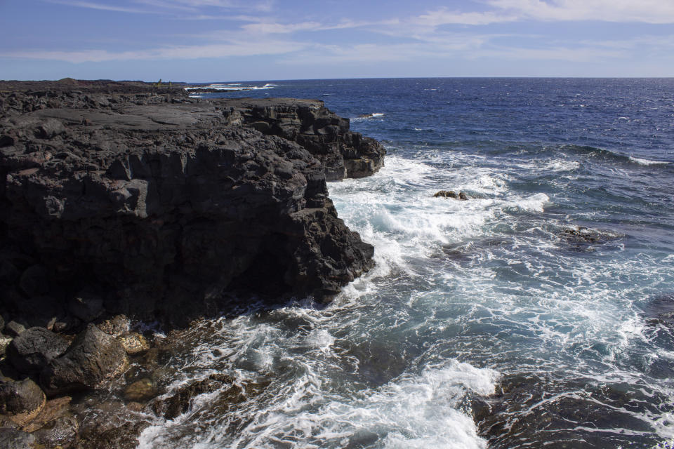 In this undated photo provided by the U.S. National Park Service, an area of Pohue Bay on Hawaii's Big Island is shown in 2021. Hawaii Volcanoes National Park on the Big Island on Tuesday, July 12, 2022, was given new land in a deal that will protect and manage an ocean bay area that is home to endangered and endemic species and to rare, culturally significant Native Hawaiian artifacts. (National Park Service via AP)