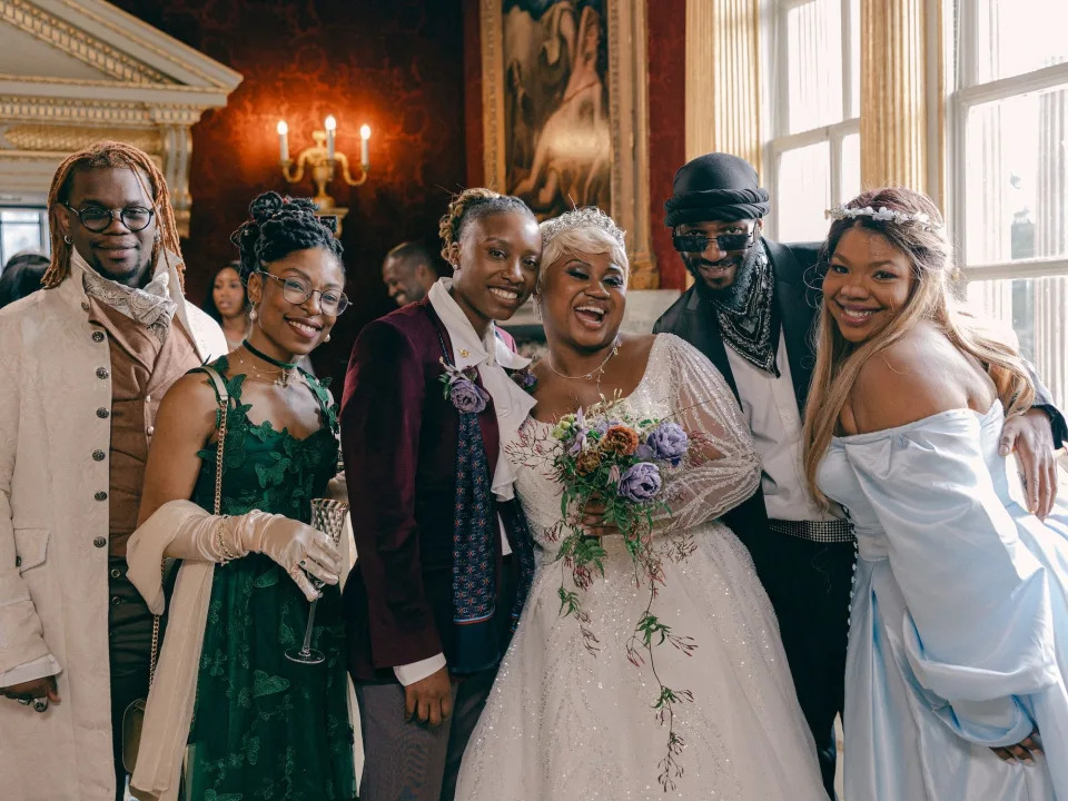 Hinton and Rae's friends and family also dressed in the "Bridgerton" style to fit the theme of the wedding.