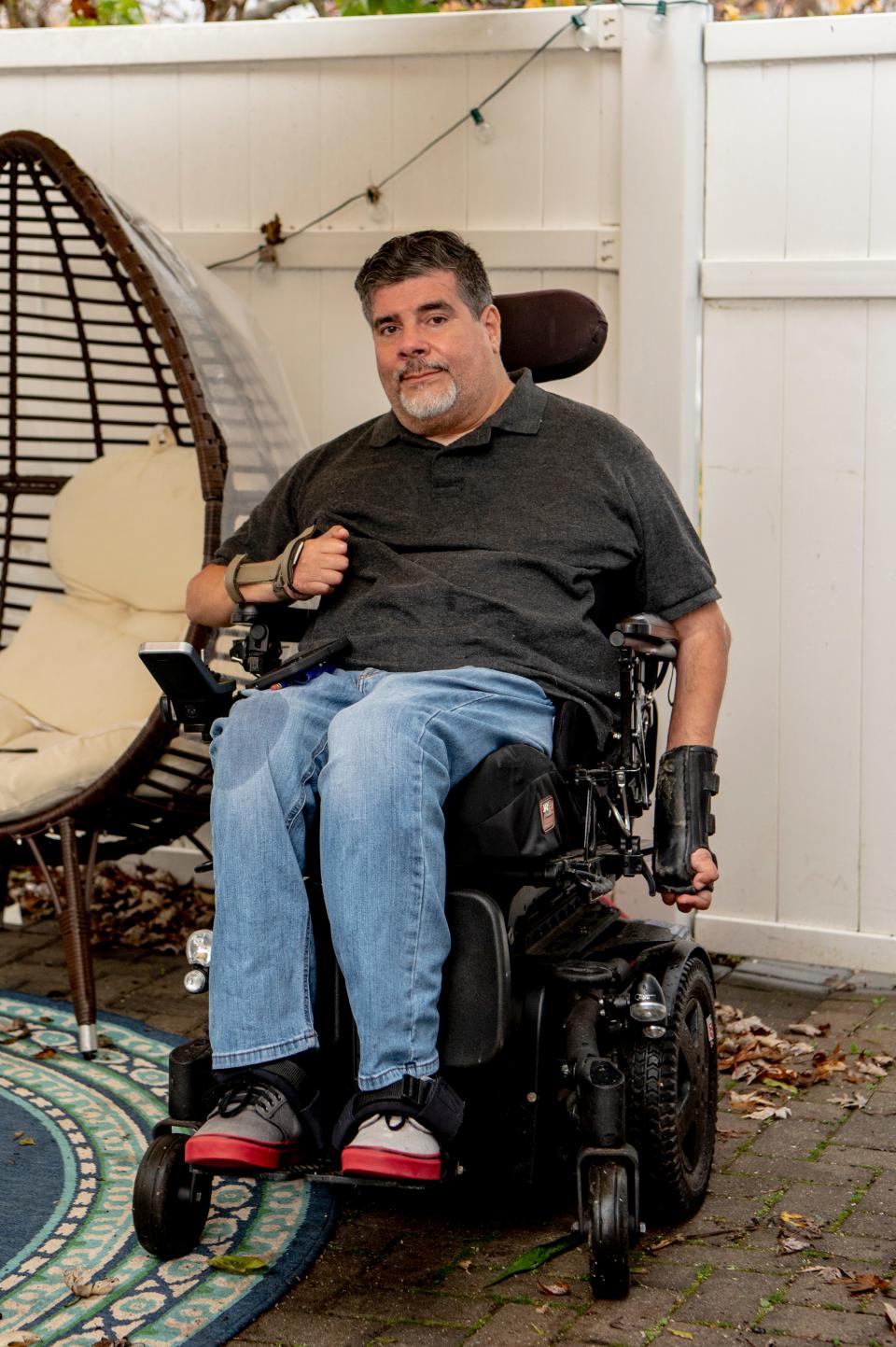 Javier Robles, Chair of The New Jersey COVID-19 Disabilities Action Committee, poses for a photo at his Edison home on Wednesday November 11, 2020. 