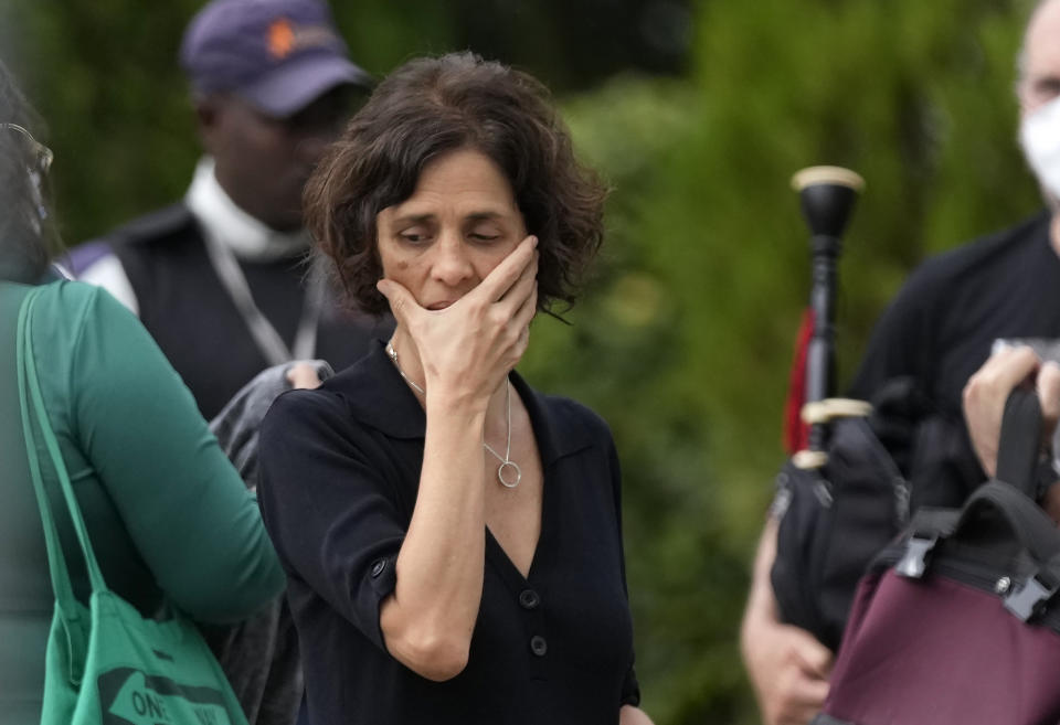 Alessandra Sampaio arrives for the funeral of her husband British journalist Dom Phillips at the Parque da Colina cemetery in Niteroi, Brazil, Sunday, June 26, 2022. Family and friends paid their final respects to Phillips who was killed in the Amazon region along with the Indigenous expert Bruno Pereira. (AP Photo/Silvia Izquierdo)