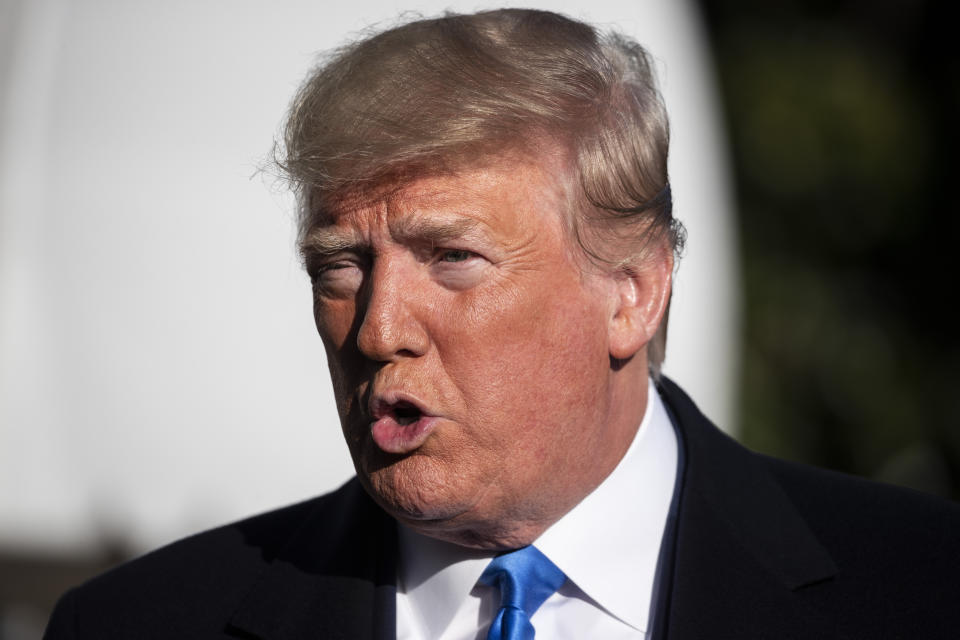 President Donald Trump speaks with reporters before boarding Marine One on the South Lawn of the White House, Saturday, Dec. 7, 2019, in Washington. (AP Photo/Alex Brandon)