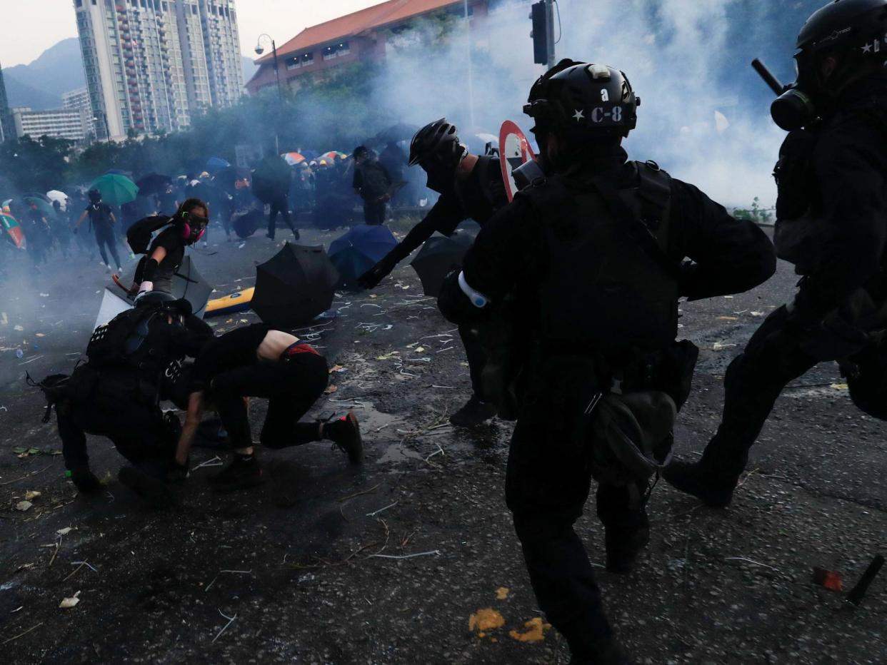 Riot police clash with anti-government protesters during a demonstration in Sha Tin district, on China's National Day: REUTERS