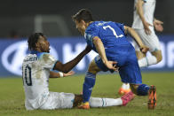 Italy's Mattia Zanotti, right, and England's Aaron Ramsey argue during a FIFA U-20 World Cup round of 16 soccer match at La Plata Stadium in La Plata, Argentina, Wednesday, May 31, 2023. (AP Photo/Gustavo Garello)