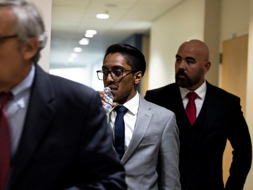 Stop the Steal organizer Ali Alexander returns to a conference room for a deposition meeting on Capitol Hill with the House select committee investigating the January 6th attack on December 09, 2021 in Washington, DC.