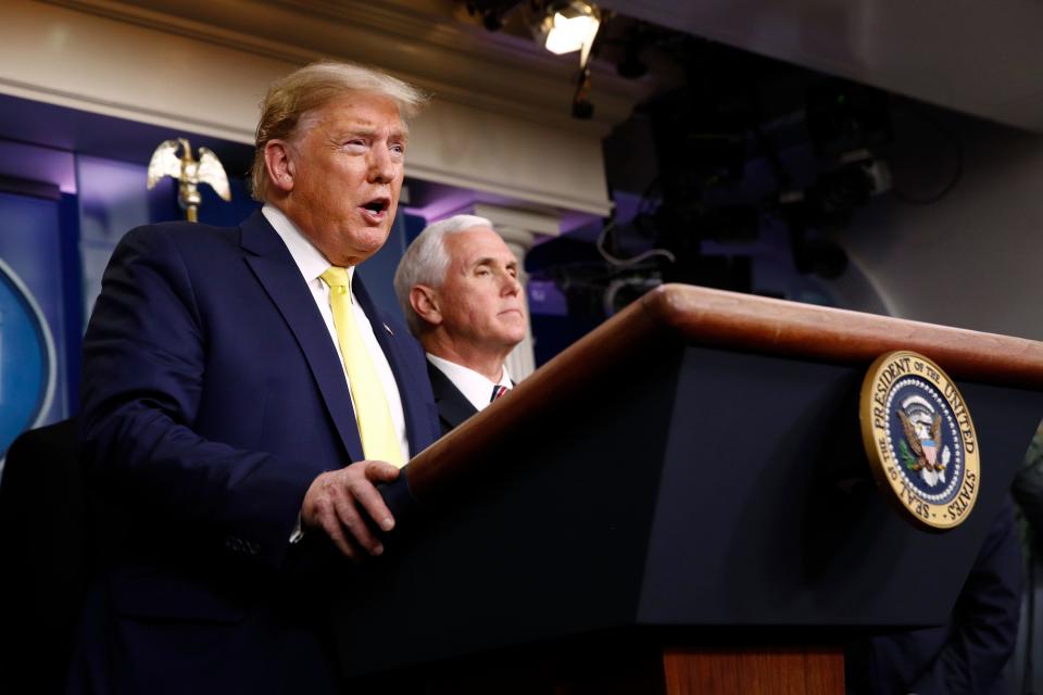 President Donald Trump speaks alongside Vice President Mike Pence in the briefing room of the White House in Washington, Monday, March 9, 2020, about the coronavirus outbreak.