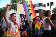 <p>Crowds supporting the Same Sex Marriage Survey party down Oxford St., in the heart of Sydney’s gay precinct on Nov. 15, 2017 in Sydney, Australia. (Photo: James Alcock/Getty Images) </p>