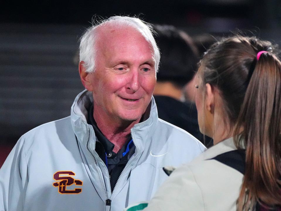 Salpointe Catholic head coach Wolfgang Weber talks with a reporter after the 4A Championship game against Saguaro at Glendale High School on Feb. 24, 2023, in Glendale.