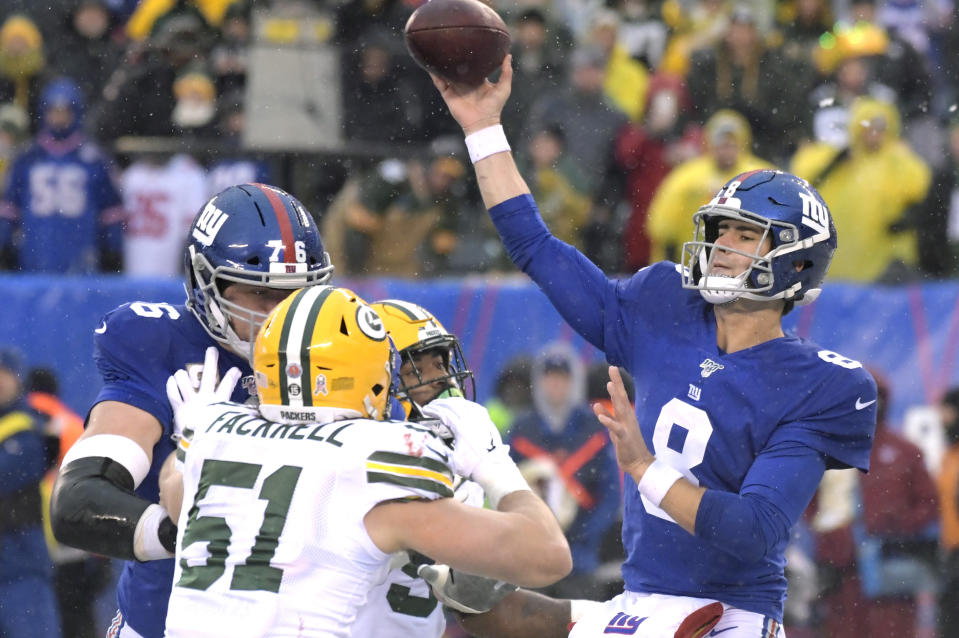 File-This Dec. 1, 2019, file photo shows New York Giants quarterback Daniel Jones (8) throwing a pass during the first half of an NFL football game against the Green Bay Packers, in East Rutherford, N.J. Jones seemingly is returning as the New York Giants starting quarterback after missing two games with a sprained right ankle. Jones took most of the first-team snaps at practice Wednesday, an major indication the rookie will start on Sunday in the penultimate game of the season against the Washington Redskins (3-11) . (AP Photo/Bill Kostroun, File)