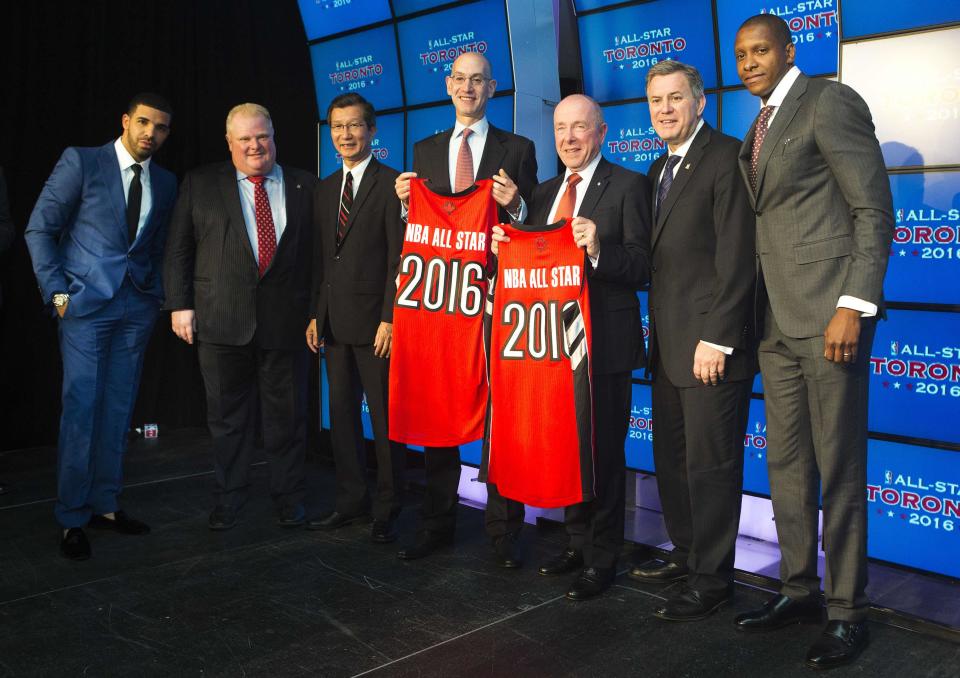 (L-R) Following an announcement that the Toronto Raptors will host the 2016 NBA All-Star game, rapper Drake, Toronto Mayor Rob Ford, Minister of Sport Michael Chan, deputy NBA commissioner Adam Silver, chairman of Maple Leaf Sports & Entertainment Larry Tanenbaum, President and CEO of Maple Leaf Sports and Entertainment Tim Leiweke, and Toronto Raptors general manager Masai Ujiri pose for a photo in Toronto, September 30, 2013. Toronto was selected as the host of the National Basketball Association's (NBA) 2016 All-Star Game, marking the first time the showcase event will be held outside of the United States, the league said on Monday. REUTERS/Mark Blinch (CANADA - Tags: SPORT BASKETBALL)