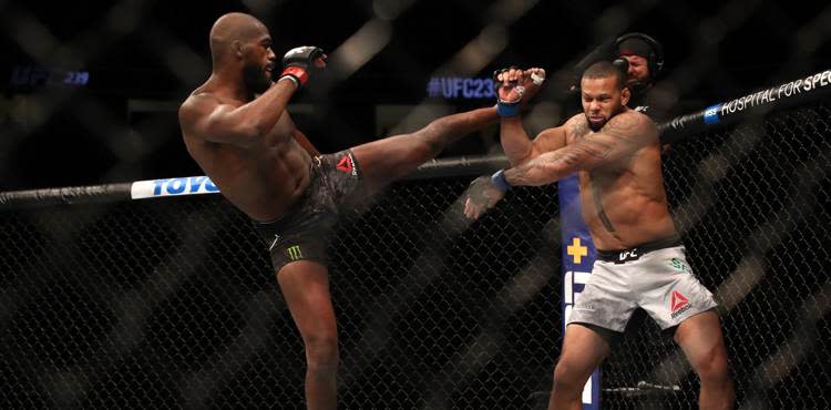 Jon Jones escapes a winged Thiago Santos by the narrowest of margins at ...