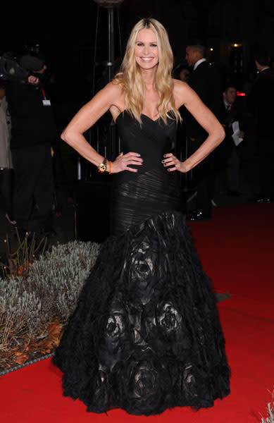 <b>Military Awards red carpet: Elle Macpherson </b><br><br>The Britain and Ireland's Next Top Model judge stole the show in this black gown with rose detail.<br><br>© Rex