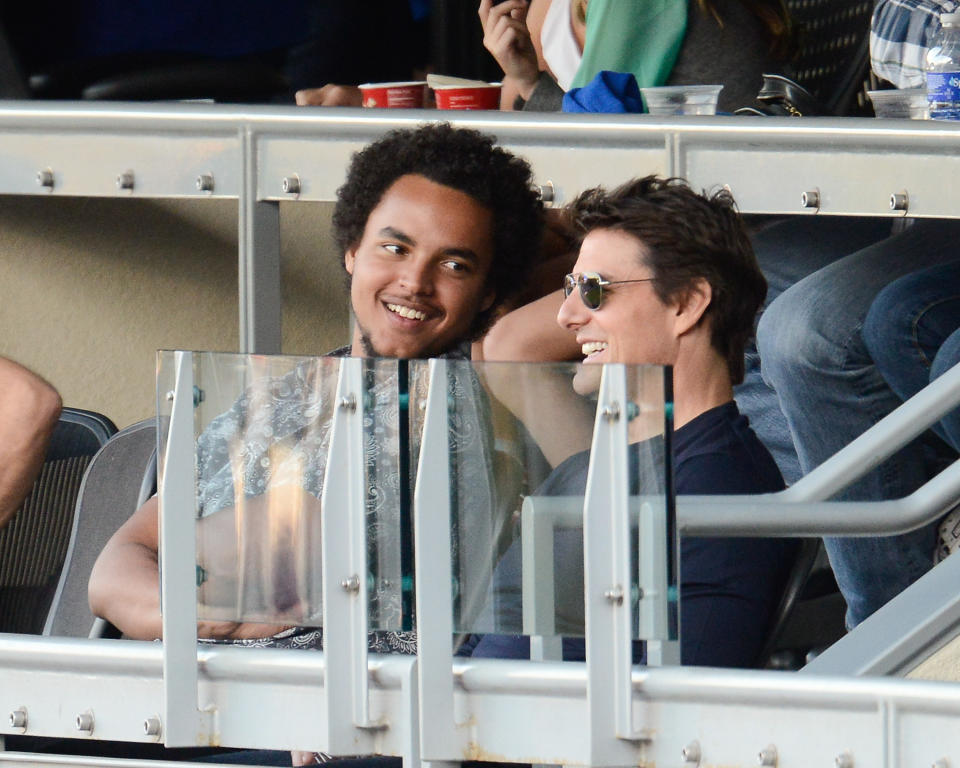 Connor Cruise and his dad, Tom Cruise, catching a Dodgers game in L.A. in October 2013. (Photo: Noel Vasquez/Getty Images)