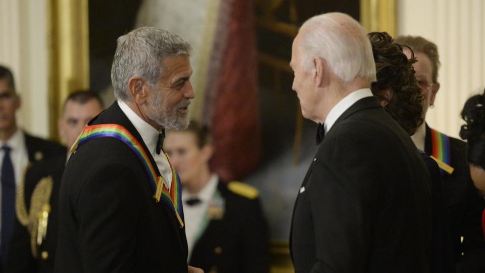 PHOTO: In this Dec, 4, 2022 file photo President Joe Biden, right, greets actor George Clooney during the Kennedy Center honoree reception in the East Room of the White House in Washington, DC. (Bonnie Cash/UPI/Bloomberg via Getty Images, FILE)