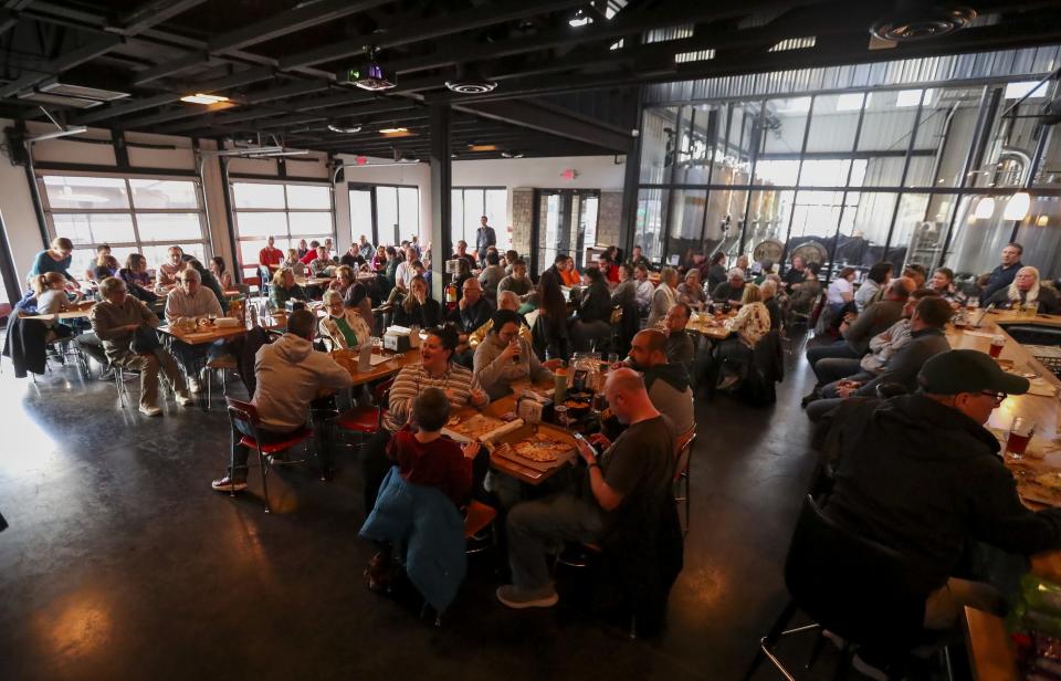 Friends, family and supporters of Green Bay's Ben Chan had some tense moments and also reasons to cheer as his run on the "Jeopardy!" Tournament of Champions came to an end Tuesday with a second-place finish and one last watch party at Zambaldi Beer in Allouez.