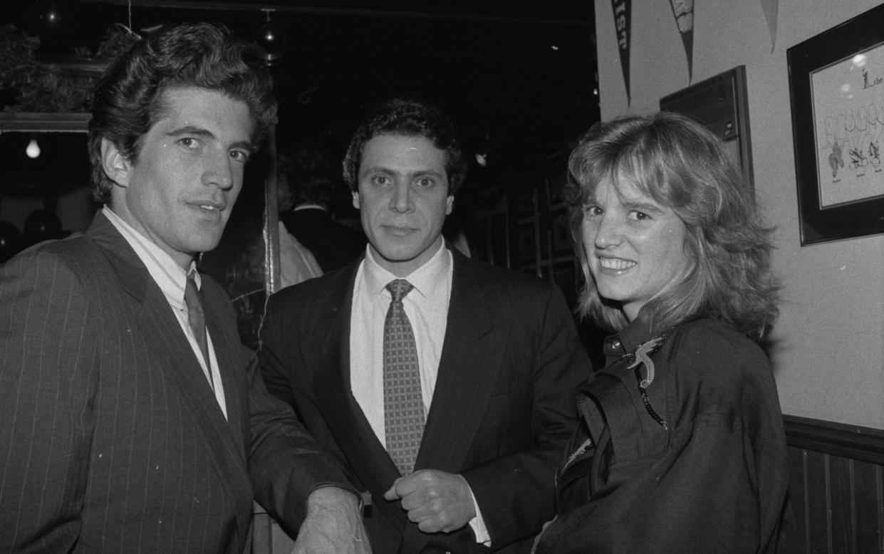 John F. Kennedy Jr., left, Andrew Cuomo and Kerry Kennedy, at Maguire's Cafe, for a fund-raiser for H.E.L.P., Cuomo's organization that builds low-income housing.