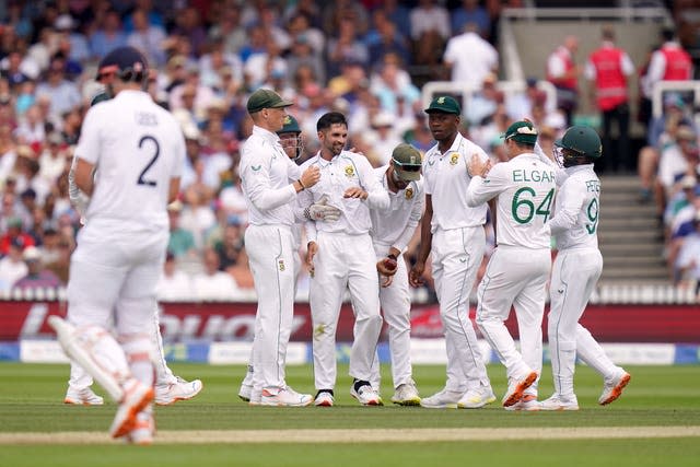 South Africa’s Keshav Maharaj celebrates with team-mates after removing Zak Crawley 