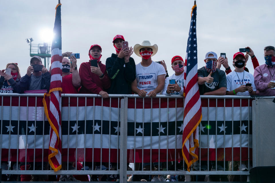 Supporters of President Donald Trump wait for his arrival to speak during a campaign rally at Fayetteville Regional Airport. 