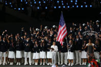 LONDON, ENGLAND - JULY 27: Mariel Zagunis of the United States Olympic fencing team carries her country's flag during the Opening Ceremony of the London 2012 Olympic Games at the Olympic Stadium on July 27, 2012 in London, England. (Photo by Alex Livesey/Getty Images)