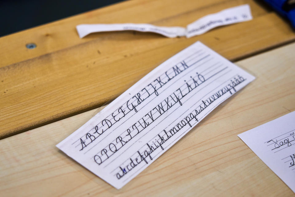 A handwriting guide to help children practice their handwriting at the Djurgardsskolan elementary school in Stockholm, Sweden, Thursday, Aug. 31, 2023. As children across Sweden have recently flocked back to school after the summer vacation, many of their teachers are putting a new emphasis on printed books, quiet reading hours, and practicing handwriting as the country's yearslong focus on the digitalization of classrooms has come under scrutiny. (AP Photo/David Keyton)