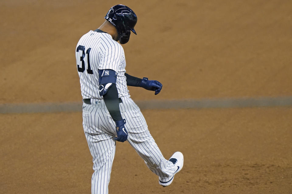 New York Yankees' Aaron Hicks (31) reacts after flying out to deep center field during the fourth inning of the team's baseball game against the Atlanta Braves, Wednesday, April 21, 2021, at Yankee Stadium in New York. (AP Photo/Kathy Willens)