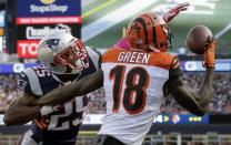 <p>New England Patriots defensive back Eric Rowe (25) reaches in to break up a pass to Cincinnati Bengals wide receiver A.J. Green (18) in the end zone during the second half of an NFL football game, Sunday, Oct. 16, 2016, in Foxborough, Mass. (AP Photo/Steven Senne) </p>