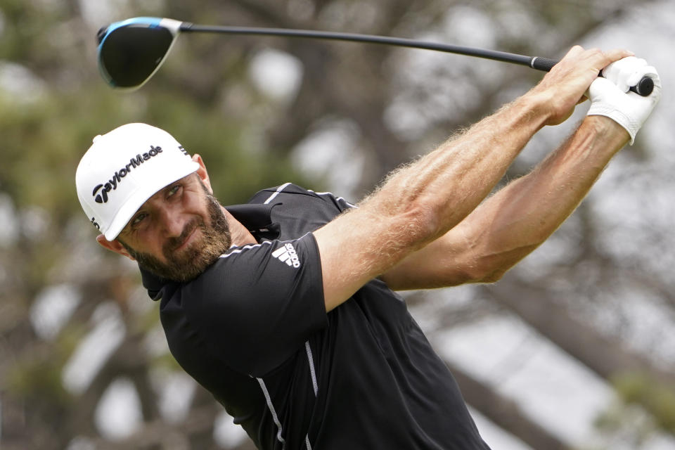 Dustin Johnson plays his shot from the fifth tee during the final round of the U.S. Open Golf Championship, Sunday, June 20, 2021, at Torrey Pines Golf Course in San Diego. (AP Photo/Jae C. Hong)