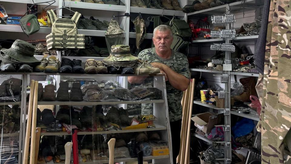 PHOTO: Serhiy Sribnyi in his shop with some of his inventory. (Dasha Sviachena/ABC News)