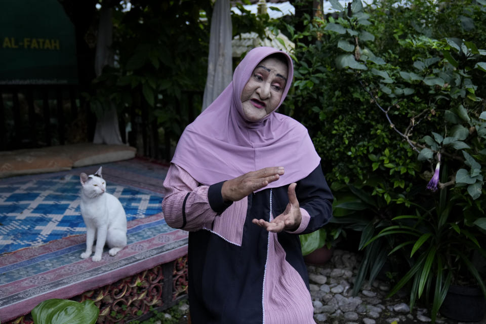 Shinta Ratri, founder of Al Fatah Islamic school for transgender women, speaks during an interview in Yogyakarta, Indonesia, Sunday, Nov. 6, 2022. The school whose students are transgender women is a rare oasis of LGBTQ acceptance – not only in Indonesia, but across the far-flung Muslim world. (AP Photo/Dita Alangkara)