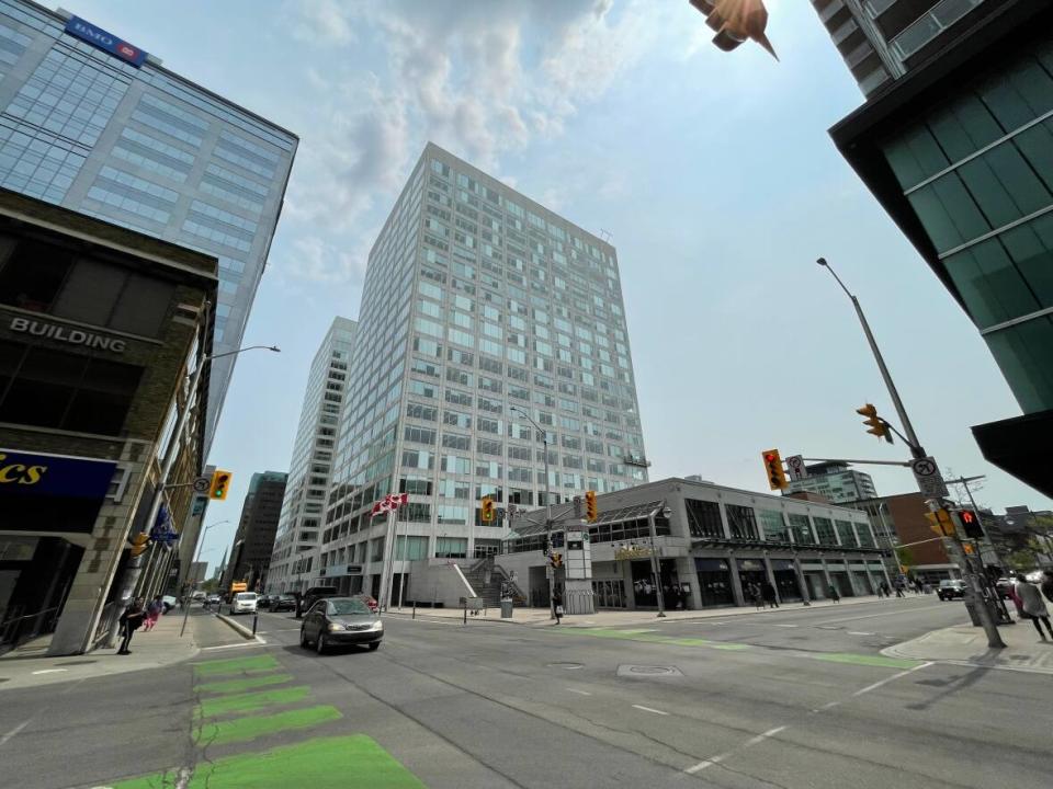 The L'Esplanade Laurier complex in downtown Ottawa, seen here May 19, 2023, has three buildings and a parking garage that could be sold soon. The site is a prime location for demolition and a mixed-use development, according to one real estate expert. (Andrew Foote/CBC - image credit)