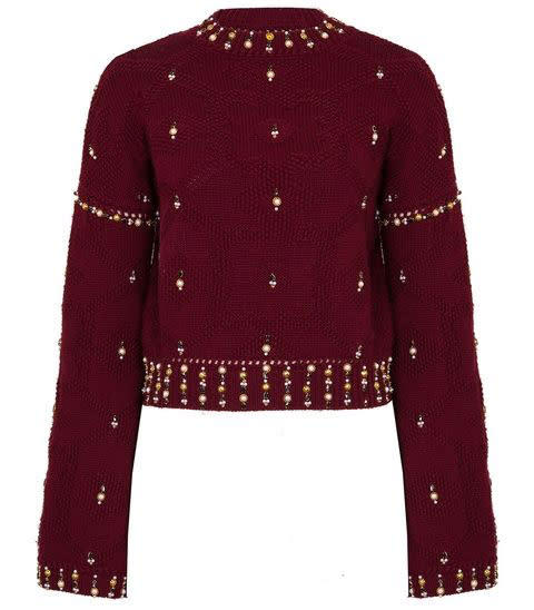 <p><strong>Jonathan Simkhai</strong> sweater, $685, shopbazaar.com</p><p><a rel="nofollow noopener" href="https://shop.harpersbazaar.com/designers/jonathan-simkhai/embellished-bell-sleeve-sweater-17245.html" target="_blank" data-ylk="slk:BUY NOW;elm:context_link;itc:0;sec:content-canvas" class="link ">BUY NOW</a><br></p>