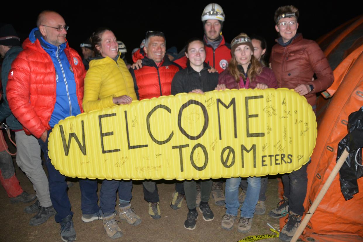 People wait to welcome U.S. explorer Mark Dickey back to the surface after he was rescued from the Morca Cave, in the Anamur district of Mersin, Turkey, 12 September 2023. (EPA)