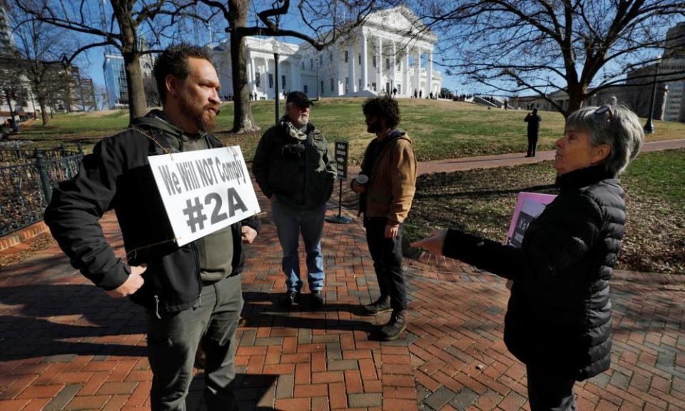 A gun rights activist outside the Virginia state capitol building as the general assembly prepares to convene in Richmond, 8 January 2020.