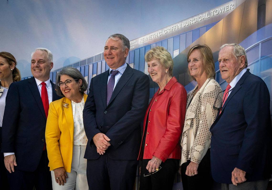 Posing for photos in front of a rendering of the new Kenneth C. Griffin Surgical Tower are, from left, Matthew A. Love, president & CEO of Nicklaus Children’s Health System; Daniella Levine Cava, mayor, Miami-Dade County; Citadel founder and CEO Ken Griffin; Barbara Nicklaus; Nan O’Leary, daughter of Jack and Barbara Nicklaus and member of the Nicklaus Children’s Health System board; and Jack Nicklaus, on January 31, 2023.