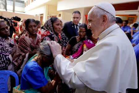 Pope Francis meets with sick people and staff of the Mother Teresa House in the Dhaka's Tejgaon neighborhood, Bangladesh, December 2, 2017. REUTERS/Andrew Medichini/Pool