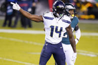 Seattle Seahawks' DK Metcalf reacts after a first down catch during the first half of an NFL football game against the Philadelphia Eagles, Monday, Nov. 30, 2020, in Philadelphia. (AP Photo/Chris Szagola)