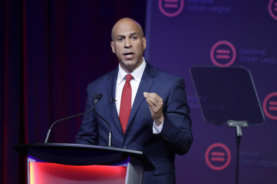 FILE - Then-Democratic presidential candidate Corey booker speaks during the National Urban League Conference in Indianapolis, in this Thursday, July 25, 2019, file photo. A bill being introduced Thursday, Dec. 17, 2020, by four Democratic lawmakers would grant college athletes sweeping rights to compensation, including a share of the revenue generated by their sports, and create a federal commission on college athletics. The College Athletes Bill of Rights is sponsored by U.S. Senators Corey Booker (D-N.J.), Richard Blumenthal (D-Conn.) and Kirsten Gillibrand (D-N.Y.), and U.S. Rep. Jan Schakowsky (D-Ill.). If passed it could wreak havoc with the NCAA's ability to govern intercollegiate athletics, and the association's model for amateurism.(AP Photo/Darron Cummings, File)